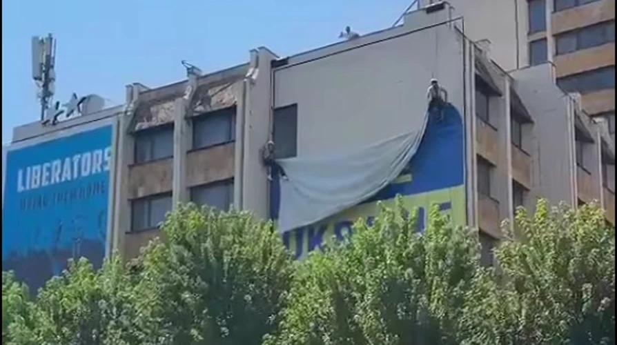 Посади і публічні дії у ситуації з українським банером у Приштині